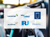 Joint letter signatories' logos with an electric car in the background